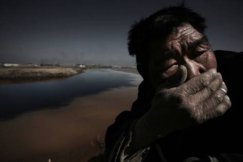 Известный фотограф снимал ужасы жизни в глубинке Китая. Он пропал без вести 3 ноября.